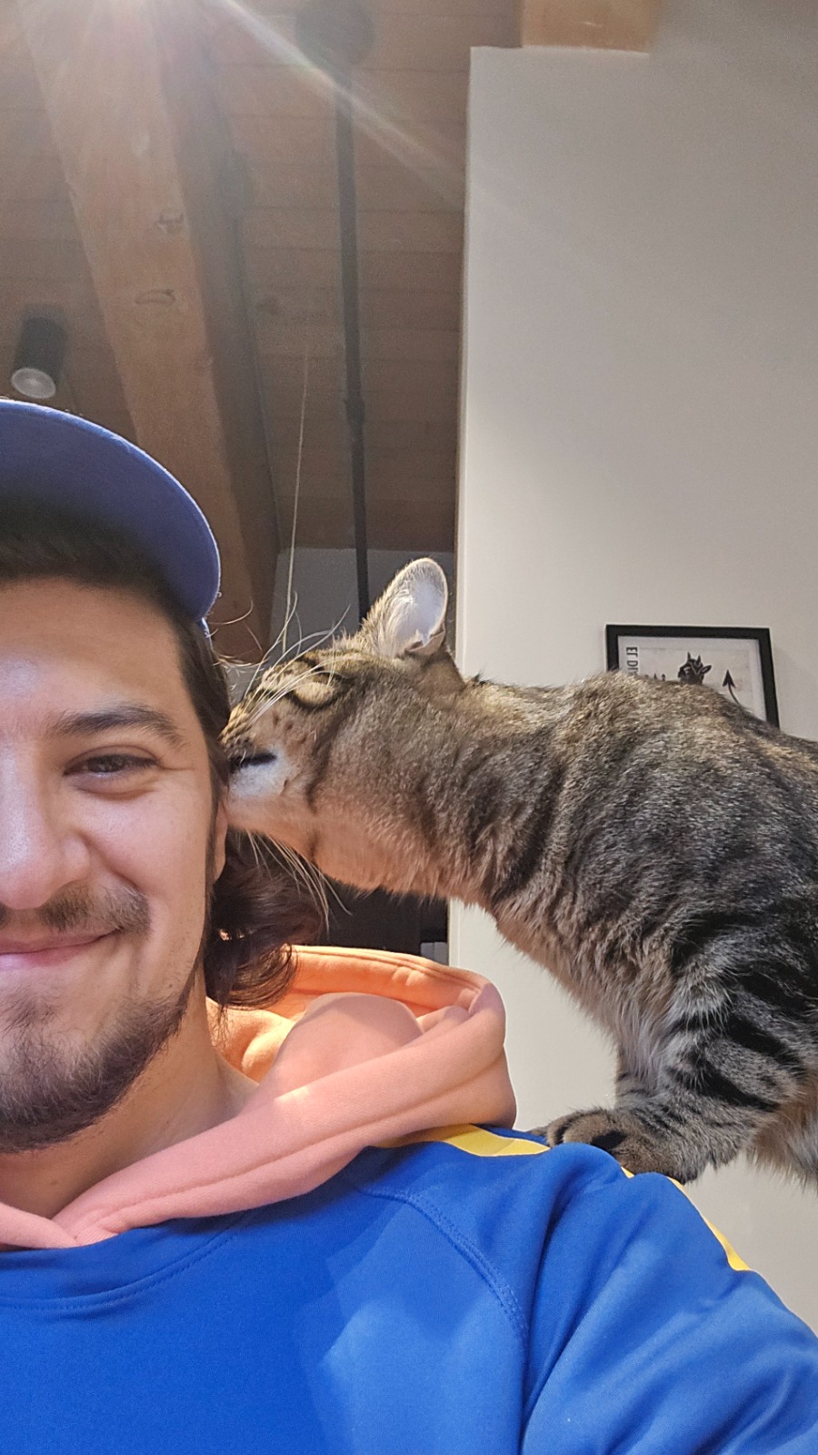 The owner of SEM Pet Services with a cat